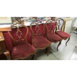 A set of 4 Victorian cabriole leg dining chairs.