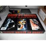 A Bond by design 'The Art of the James Bond films' hardback book in cover (folio style)