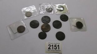 A collection of coins including Charles II 1672-1675 farthing, George 1, 1717, 1718,