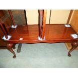 A mahogany long coffee table, height 43cm, table top size 45.5cm x 104cm approx.