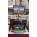 Ten assorted jigsaw puzzles including Lindisfarne castle garden sealed in package,