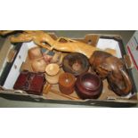 A large box of mixed wooden items including wood turnings, elephant etc.