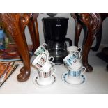 8 Ridgeway Masquerade bone china coffee cups and saucers along with a coffee perculator