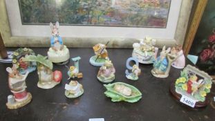 A collection of Beatrix Potter figures including musical including Border Fine Arts,