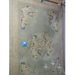 A Chinese carpet with central dragon and dragons in each corner, 184 x 123 cm.