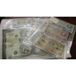 A mixed lot of English and Scottish bank notes including 13 one pound notes and 3 ten shilling