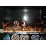 A good selection of treen and carved wooden items including elephant, antelope etc.