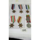 A sheet of 7 British war medals.