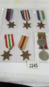 A sheet of 7 British war medals.