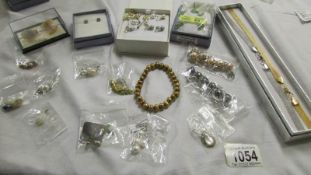 A mixed lot of pendants, earrings and bracelets.