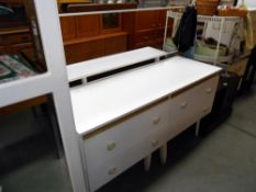 A vintage white melamine mirror back dressing table, height 118cm, width 130cm approx.