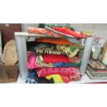 A good lot of Sari's, Egyptian themed clothing including dresses, scarves etc.