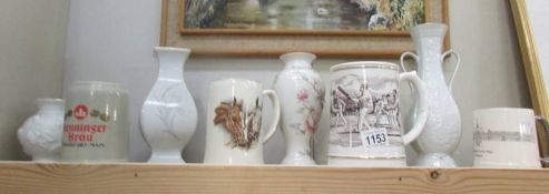 A mixed lot of tankards and vases etc.