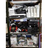 3 shelves of gaming systems, X-Box,