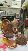 A mixed lot of copper ware including jelly mould, tall jug, wall plaque etc.