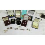 A mixed lot of earrings including clip on and a pendant.