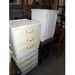 3 pieces of white melamine bedroom furniture, 2 chest of drawers and a side cupboard,