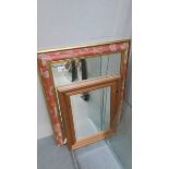 2 framed bevel edged mirrors.