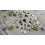 Approximately 30 pairs of earrings including clip on.