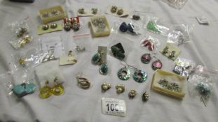 Approximately 30 pairs of earrings including clip on.