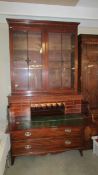 An Early Victorian Secretaire Bookcase with string inlay, excellent interior.