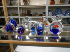 A quantity of paperweights ,