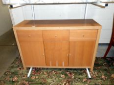 A light oak veneered 3 drawer,