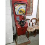 A rare old amusement machine "The Bull" in need of attention.