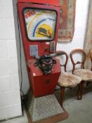 A rare old amusement machine "The Bull" in need of attention.