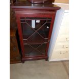 A darkwood stained display cabinet with decorative door, Height 99cm,