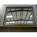 A large gilt framed bevelled edged mirror size 86cm x 61cm