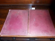 2 volumes entitled famous paintings