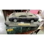 A boxed Maisto Jaguar XJ220 1992 collector's 1:12 model (very dusty).