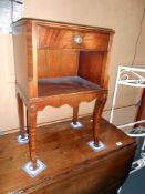 A mahogany cross banded side table, height 68cm, width 43cm approx.