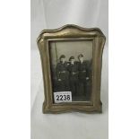 A hall marked silver photo frame.