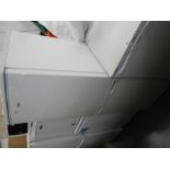 A tall Logik fridge freezer with instructions (model LFC50W12)