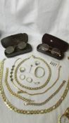 A mixed lot of gold coloured jewellery etc.