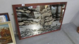 A large framed mirror tile picture of a galleon in rough seas, image 91 x 61 cm, framed 99 x 69 cm,