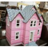 A nice dolls house with furniture.
