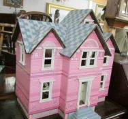 A nice dolls house with furniture.