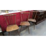 3 Ercol style stick back kitchen chairs.