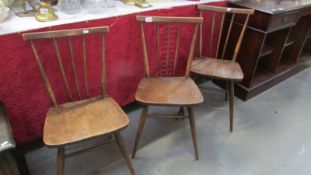 3 Ercol style stick back kitchen chairs.