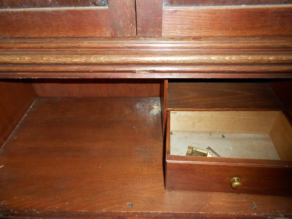 A 1920'30's oak bureau bookcase (lock and escutcheon in drawer and needs to be fixed back on), - Image 2 of 2