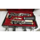 A cased clarinet.