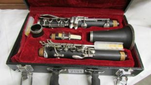 A cased clarinet.