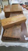 A large wood cutlery box and 3 other boxes.