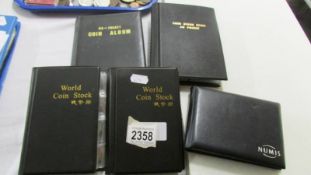 5 stock books of world coins.