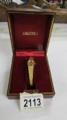 A boxed Seiko wind up ladies wrist watch, 1/50 18ct gold finish, in working order.