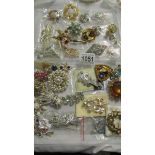 Approximately 30 vintage brooches.