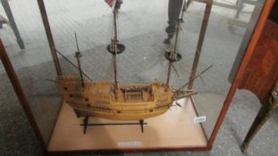 A cased model of The Mayflower.
